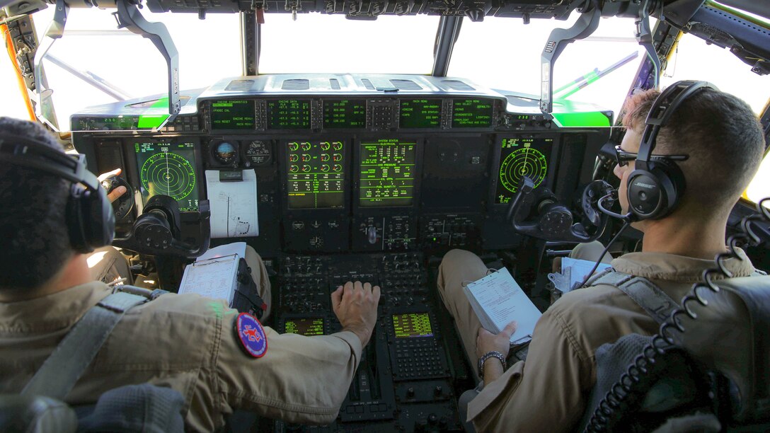 Capt. Orlando R. Samudio, left, and Capt. Mike A. Jordan pilot a KC-130J Super Hercules during tactical navigation training above Hunter Army Airfield, Ga., Oct. 23, 2014. The training allows pilots to hone skills through disparate terrain to avoid ground threats. Samudio and Jordan are both naval aviators with Marine Aerial Refueler Transport Squadron 252. Samudio is a native of Austin, Texas and Jordan is a native to Decatur, Texas.