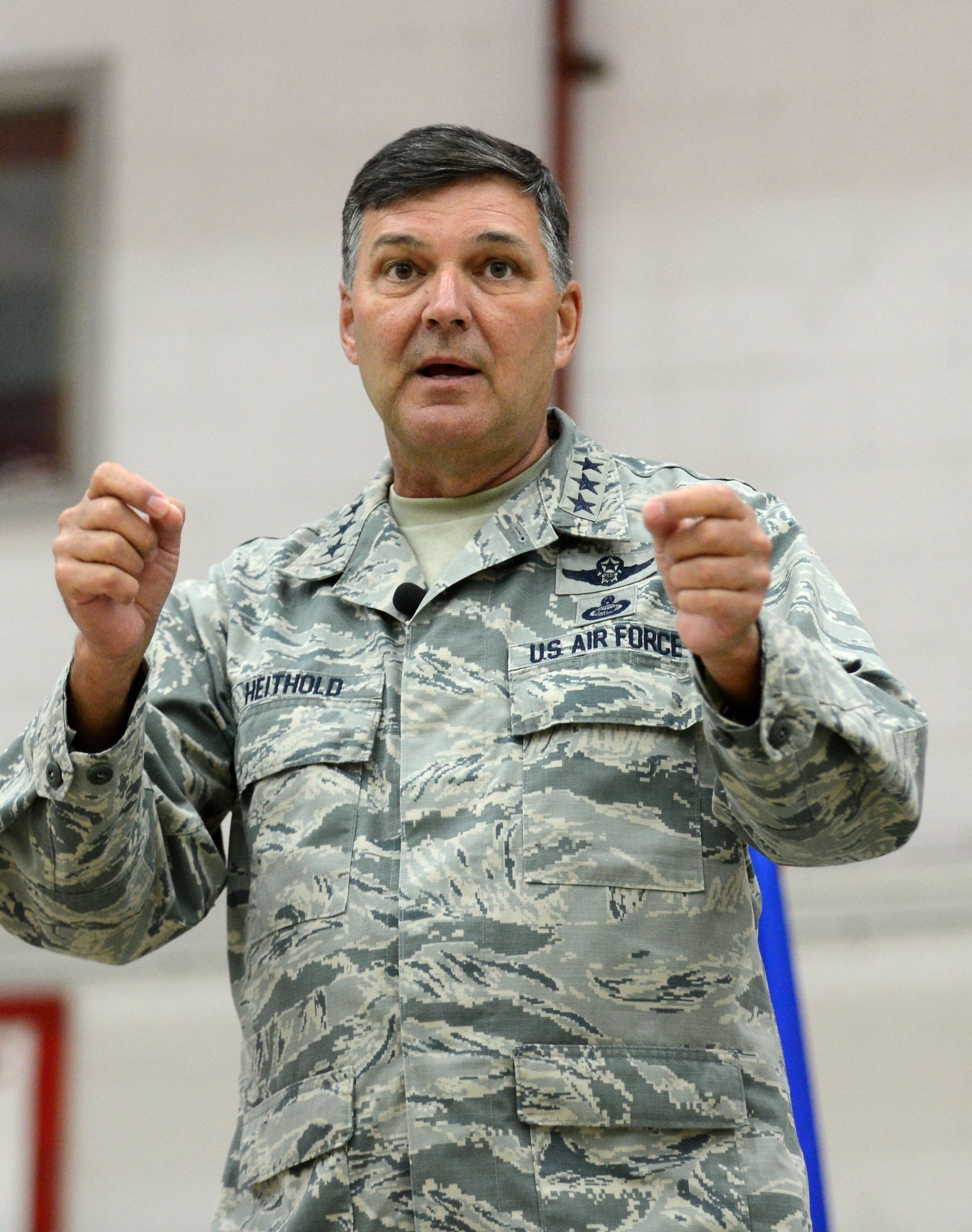 Lt. Gen. Bradley Heithold, Air Force Special Operations Command commander, speaks to Air Commandos during the 352nd Special Operations Group All-Call in hangar 803 Oct. 27, 2014, on RAF Mildenhall, England. Heithold visited a multitude of Airmen and their workplaces to discuss important matters, get a better understanding of their needs to accomplish the mission as well as deliver his vision and priorities. (U.S. Air Force photo by Senior Airman Kate Maurer)