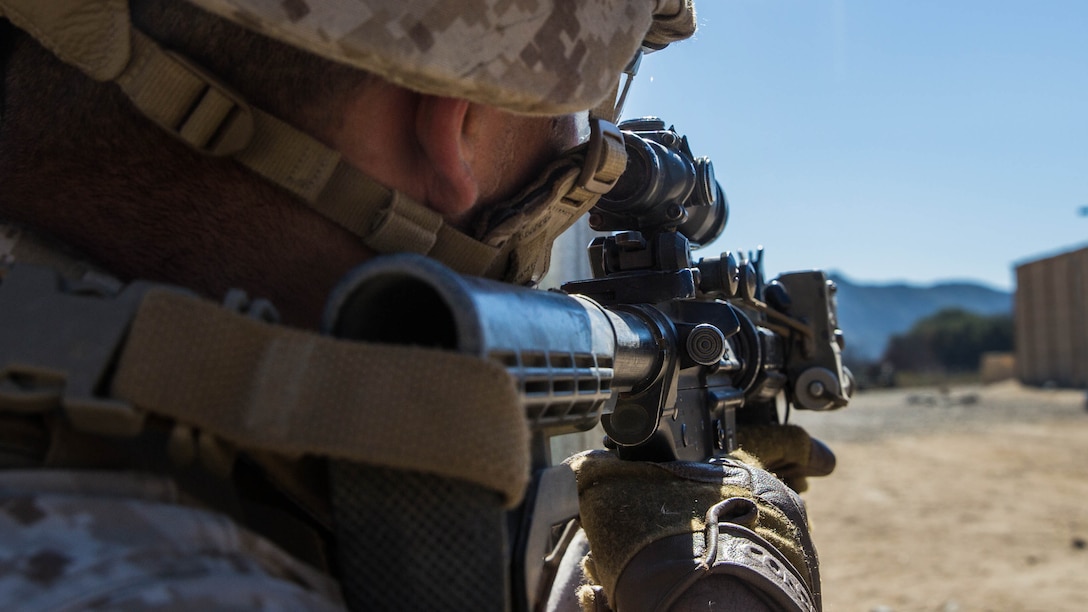 U.S. Marine Cpl. Roman Fernandez provides security during a vertical-assault raid course aboard Camp Pendleton, Calif., Oct. 29, 2014. Fernandez, 21, is from Madera, Calif., and is a team leader with Lima Company, Battalion Landing Team 3rd Battalion, 1st Marine Regiment, 15th Marine Expeditionary Unit. The course teaches vertical assault techniques and the importance of working together as a cohesive unit during a raid. 