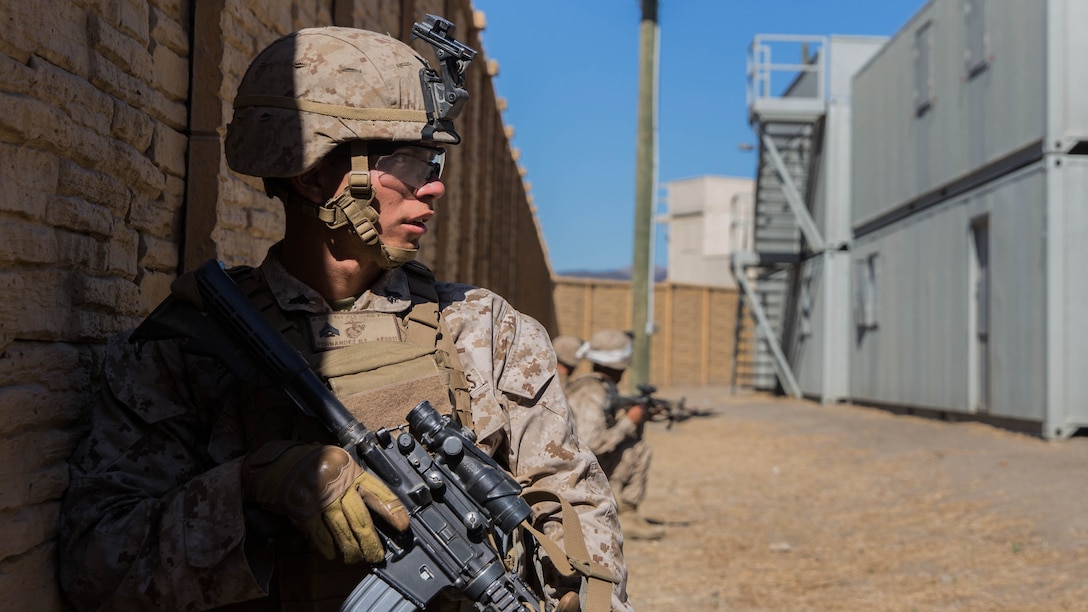 U.S. Marine Cpl. Roman Fernandez provides security during a vertical-assault raid course aboard Camp Pendleton, Calif., Oct. 29, 2014. Fernandez, 21, is from Madera, Calif., and is a team leader with Lima Company, Battalion Landing Team 3rd Battalion, 1st Marine Regiment, 15th Marine Expeditionary Unit. The course teaches vertical assault techniques and the importance of working together as a cohesive unit during a raid. 
