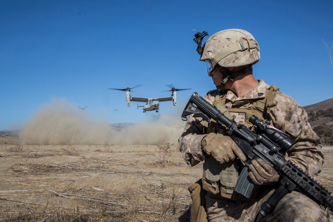 U.S. Marine Sgt. Christopher Yaun provides security during a vertical assault raid exercise aboard Camp Pendleton, Calif., Oct. 28, 2014. Yaun is a team leader with Lima Company, Battalion Landing Team 3rd Battalion, 1st Marine Regiment, 15th Marine Expeditionary Unit. (U.S. Marine Corps photo by Sgt. Emmanuel Ramos/Released)