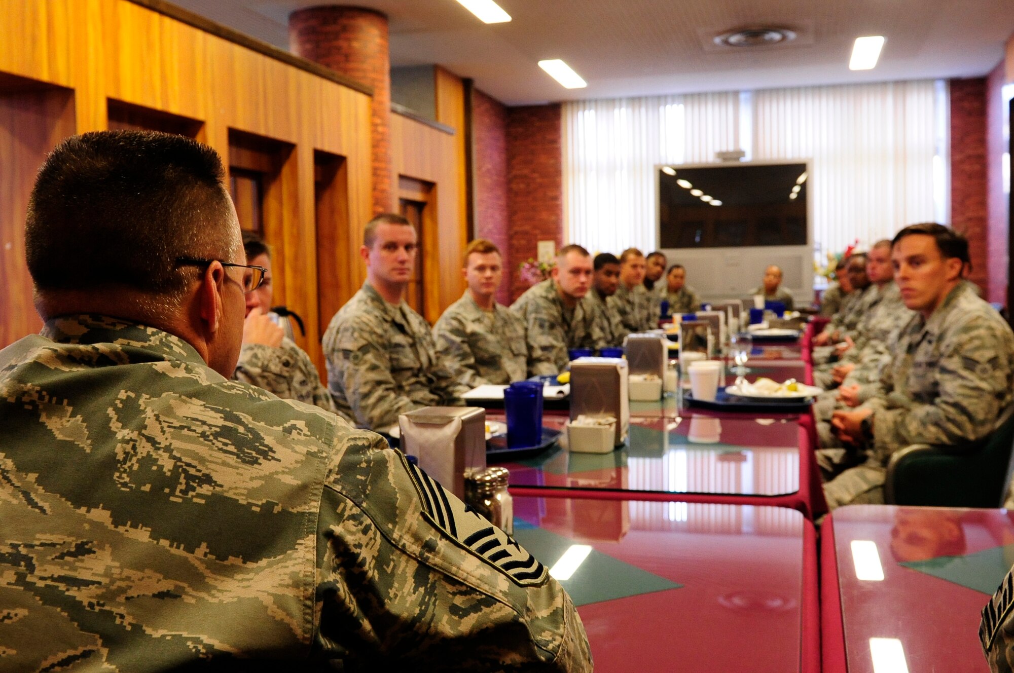 U.S. Air Force Chief Master Sgt. Harold Hutchison, Pacific Air Forces command chief, sat down for breakfast with Airmen of the 18th Wing during his visit to Kadena Air Base, Japan, Oct.29, 2014. Hutchison spoke on the topics affecting PACAF and today's Air Force such as the new enlisted performance report system, sexual assaults, curfew and restrictions. (U.S. Air Force photo by Airman 1st Class Keith James/Released)