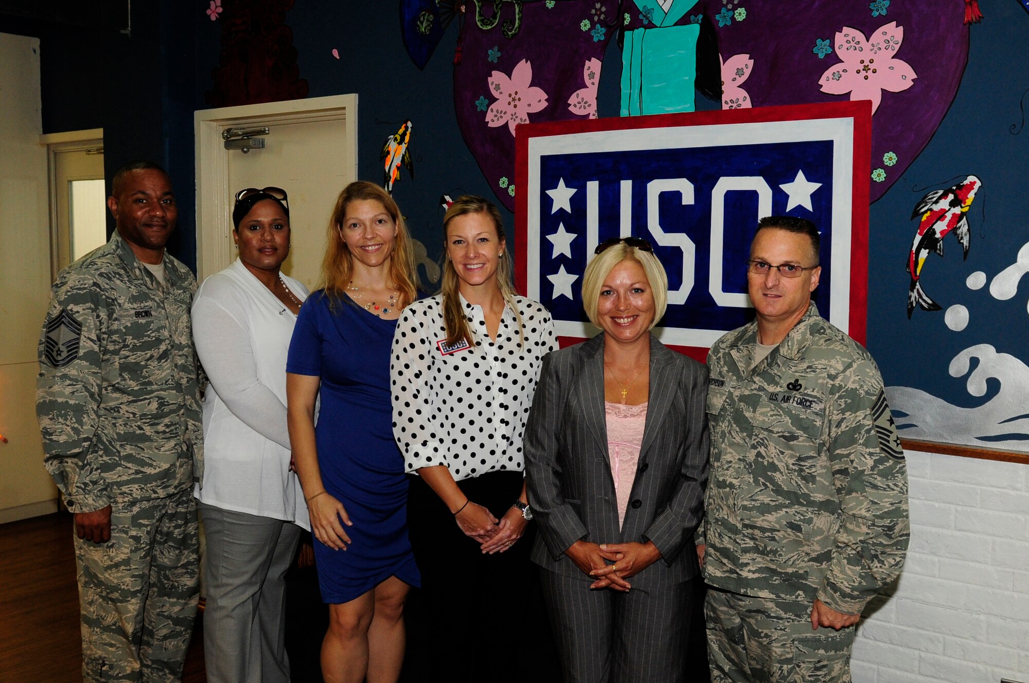U.S. Air Force Chief Master Sgt. Harold Hutchison, Pacific Air Forces command chief, visits the United Service Organizations on Kadena Air Base, Japan, Oct.28, 2014. As one of many stops while visiting the 18th Wing, Hutchison toured the USO, learning about its role and programs geared toward assisting families of the men and women stationed at Kadena. (U.S. Air Force photo by Airman 1st Class Keith James/Released)