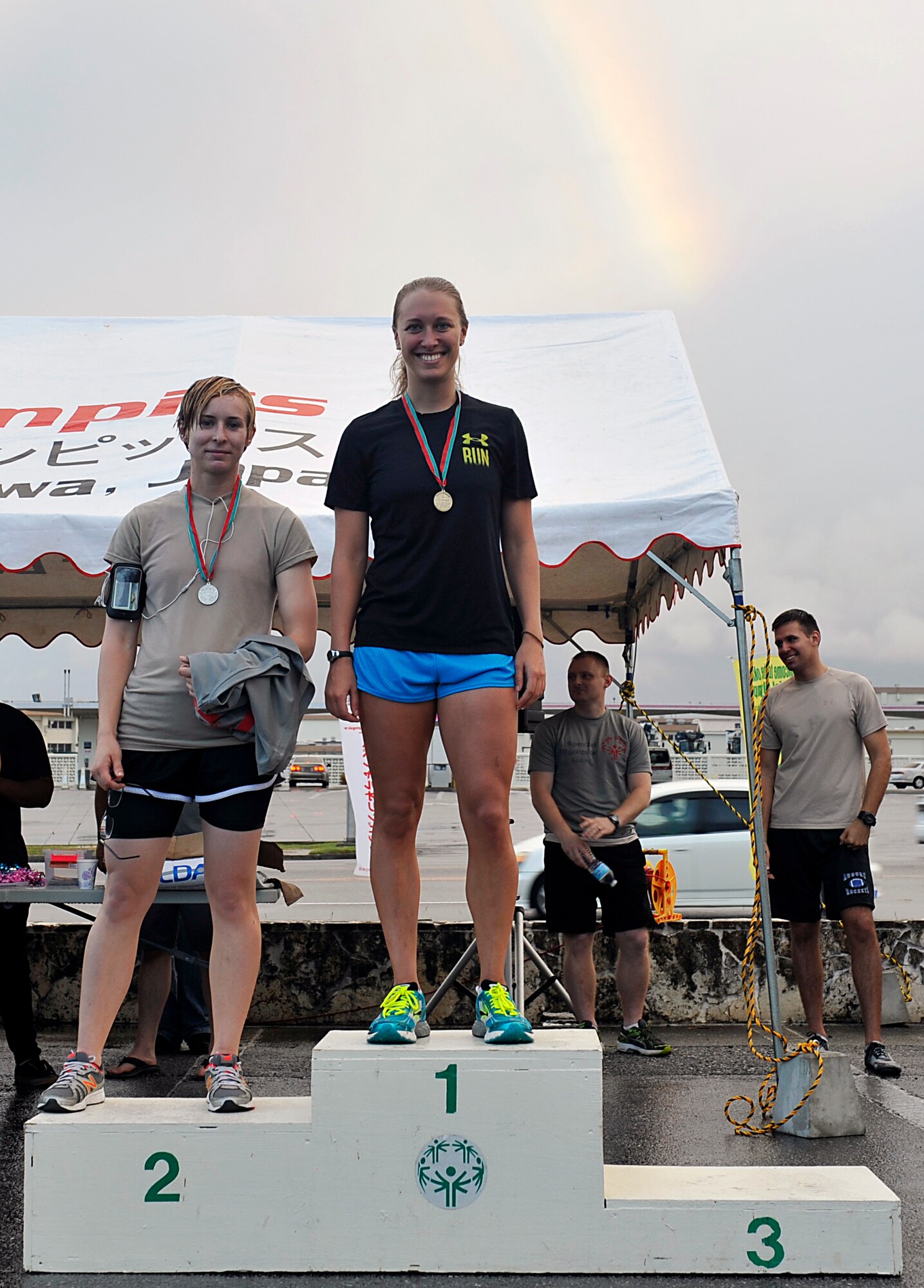 The 353rd Special Operations Group conducted a 5k fun run to support the Kadena Special Olympics on Kadena Air Base, Japan, Oct. 31, 2014. The first two female runners to cross the finish line of the KSO 5k fun run were: U.S. Air Force 1st Lt. Allison Paddock, 18th Comptroller Squadron budget analyst, in first place with 21 minutes, 45 seconds; and Airman 1st Class Stephanie Lopez, 353rd Special Operations Support Squadron network systems operator, in second place with 22:25. (U.S. Air Force photo by Naoto Anazawa/Released)