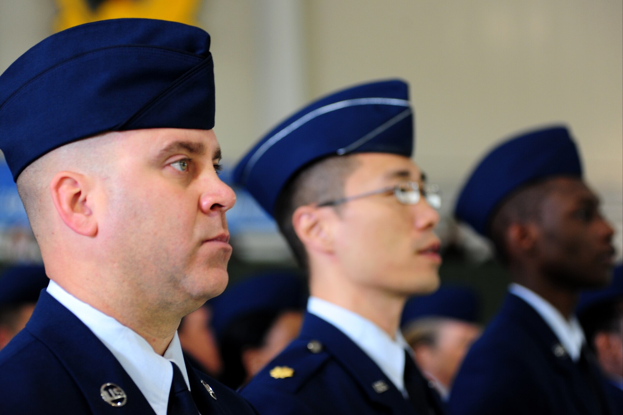 Joint Base Langley-Eustis Airmen stand at attention during the Air Combat Command change of command ceremony at Langley Air Force Base, Va., Nov. 4, 2014. U.S. Air Force Gen. Mike Hostage relinquished command of ACC after serving as commander for more than three years. (U.S. Air Force photo by Airman 1st Class Areca T. Wilson/Released) 