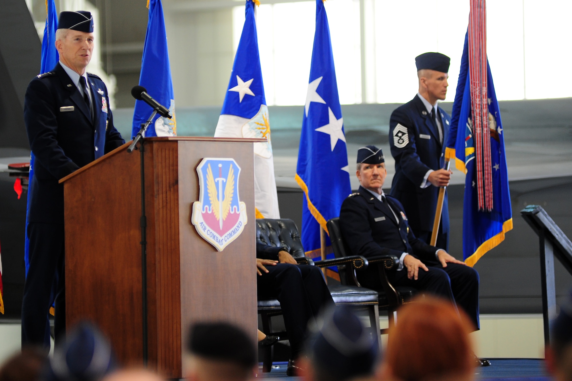 U.S. Air Force Gen. Mike Hostage, former commander of Air Combat Command, addresses the crowd during the ACC change of command ceremony at Langley Air Force Base, Va., Nov. 4, 2014. Hostage relinquished command of ACC to Gen. Hawk Carlisle and retires from the Air Force after 37 years of service.  (U.S. Air Force photo by Airman 1st Class Areca T. Wilson/Released) 