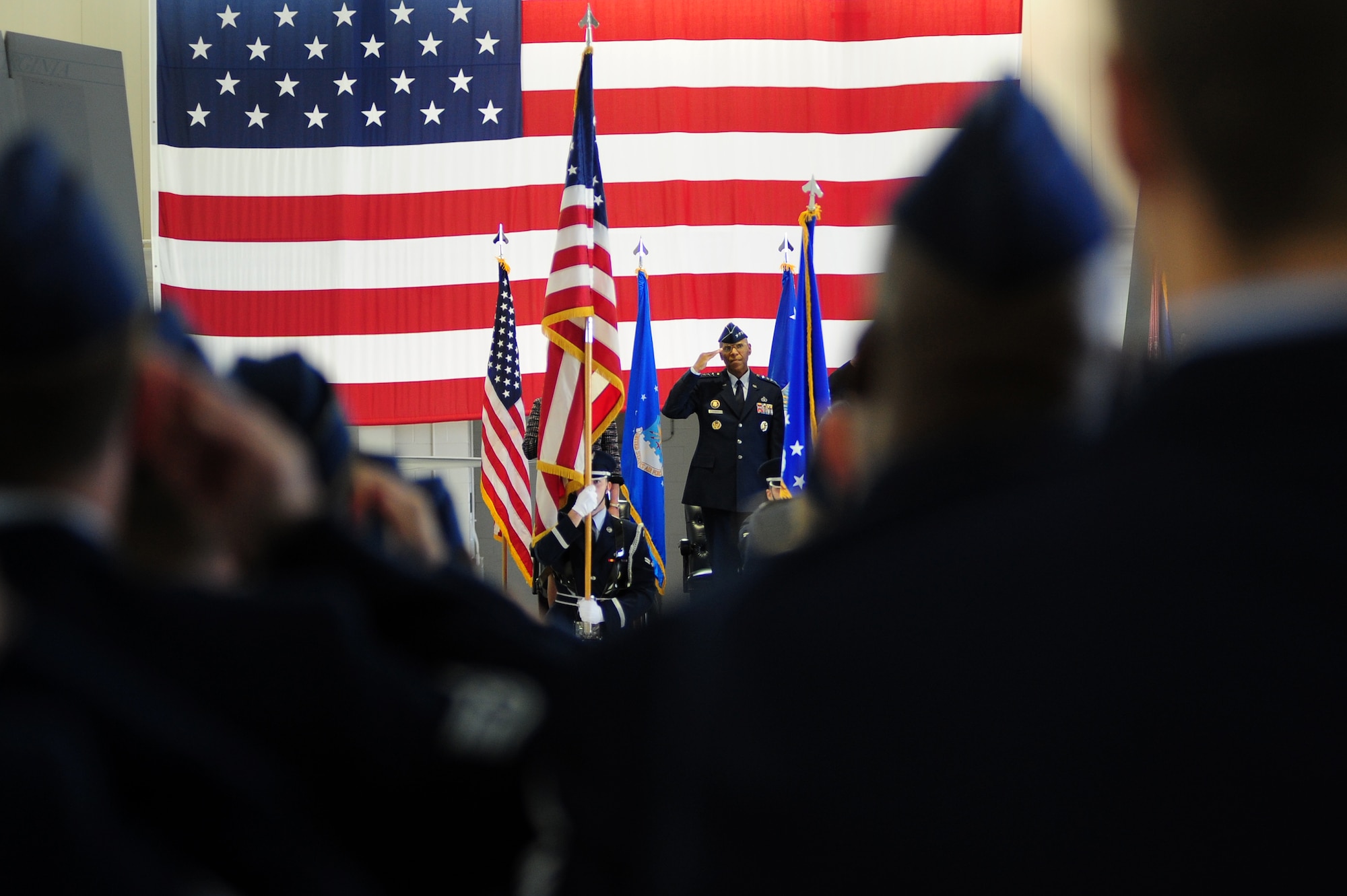 U.S. Air Force Vice Chief of Staff Gen. Larry O. Spencer, salutes Air Combat Command Airmen during ACC’s change of command ceremony at Langley Air Force Base, Va., Nov. 4, 2014. Gen. Hawk Carlisle took the reins as ACC’s commander after serving as the commander of Pacific Air Forces, Joint Base Pearl Harbor-Hickam, Hawaii, for more than two years. (U.S. Air Force photo by Airman 1st Class Areca T. Wilson/Released) 