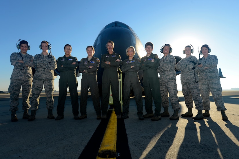 U.S. Air Force Lt. Col. Debi Rieflin, 315th Operation Support Squadron instructor pilot, poses with her first all female crew before her final (fini) flight in a C-17 Globemaster III Oct. 27, 2014 at Joint Base Charleston. Rieflin is the first female C-17 aircraft commander with 21 years in the aircraft and retiring with 31 years in the Air Force. (U.S. Air Force photo/Senior Airman Sandra Welch)