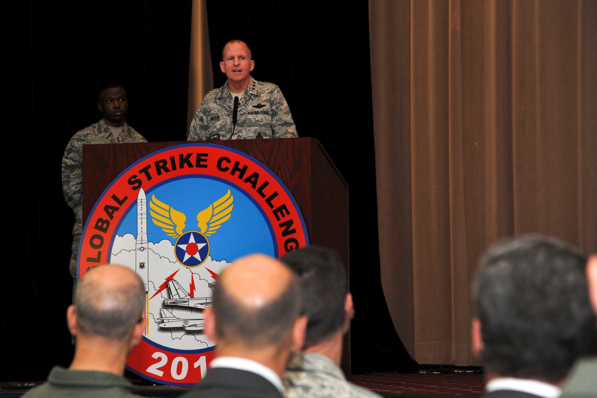 Lt. Gen. Stephen Wilson, commander of Air Force Global Strike Command, makes the opening remarks at Global Strike Challenge 2014 Technology and Innovation Symposium hosted by Barksdale Air Force Base, La., Nov. 4. The Technology and Innovation Symposium is part of GSC capstone activities that culminate here Nov. 5, with score posting and naming this year's "best of the best." GSC is the nation's premier bomber, intercontinental ballistic missile, helicopter operations and security forces competition with units from AFGSC, Air Combat Command, Air Force Reserve Command and the Air National Guard. More than 350 competitors and around 800 total attended the three day capstone events. (U.S. Air Force photo/Senior Airman Jannelle Dickey)