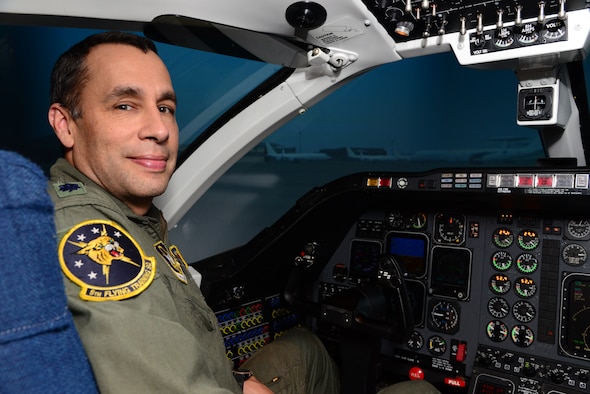 Lt. Col. Mark Lyons, a 5th Flying Training Squadron instructor pilot, sits in a T-1A Jayhawk flight simulator.  As part of the Energy Analysis Task Force, Lyons is teaching student pilots how to fly in a more fuel-efficient manner in flight simulators. The overarching goal of this training is to create an energy-aware culture in the Air Force, specifically in the flying community. (U.S. Air Force photo/Senior Airman Frank Casciotta)