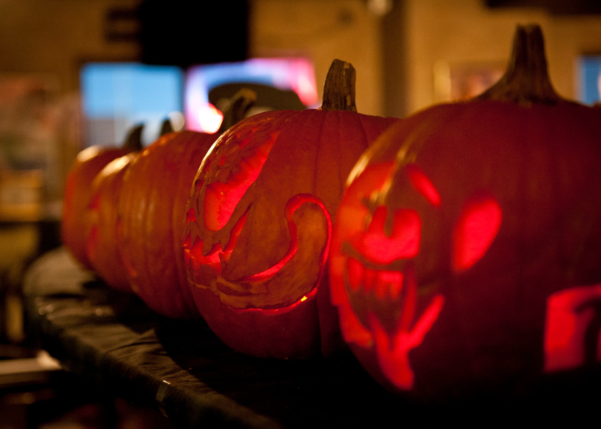 PETERSON AIR FORCE BASE, Colo. – Carved pumpkins sit on a counter waiting to be judged at the second annual pumpkin carving contest at the Cyber Café Oct. 29. Five teams participated in the pumpkin carving contest sponsored by the Peterson AFB Chapel. (U.S. Air Force photo/Airman 1st Class Rose Gudex)