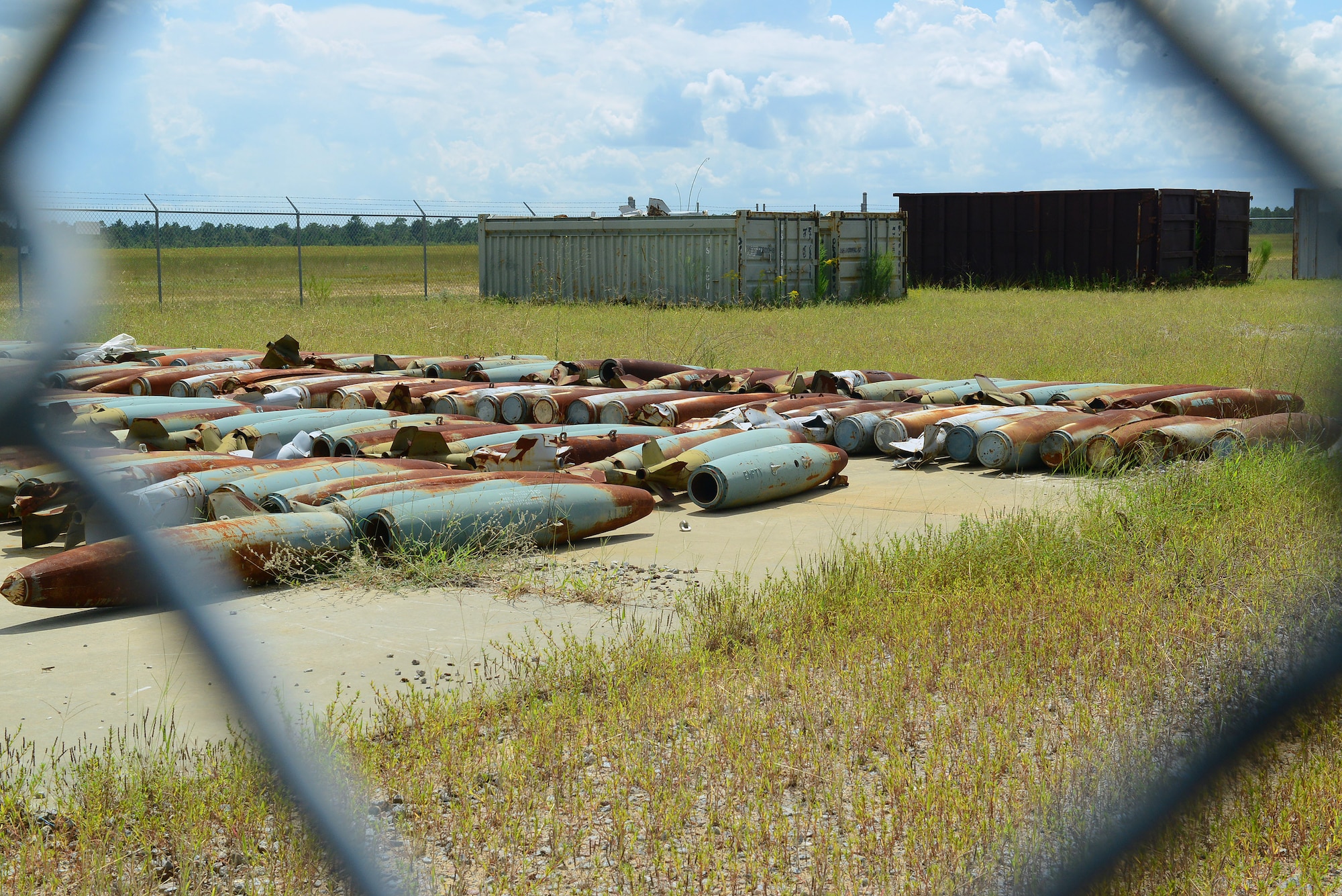 Munitions cleared of all hazards wait to be made into scrap metal at Poinsett Electronic Combat Range, Sumter, S.C., Sept. 4, 2014. Every six months, explosive ordnance disposal Airmen remove any explosive hazards and clear the range of all munitions. (U.S. Air Force photo by Airman 1st Class Diana M. Cossaboom/Released)