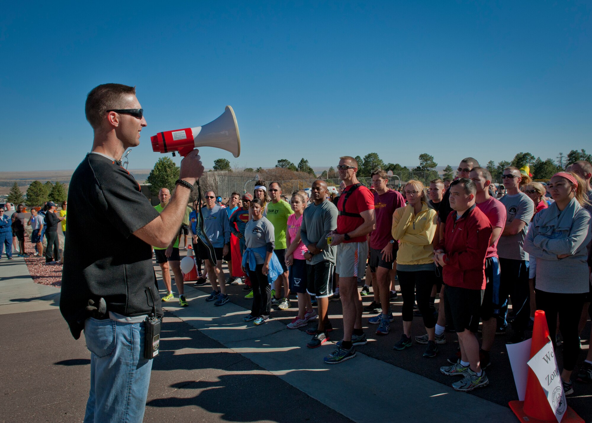 CHEYENNE MOUNTAIN AIR FORCE STATION, Colo. – Zombie runners get their instructions at the first-ever 5k Zombie Tunnel Fun Run at Cheyenne Mountain Oct. 30. The Zombie Run was open to any military member and their family from Peterson Air Force Base, Schriever AFB, the U.S. Air Force Academy and Fort Carson. (U.S. Air Force photo/Airman 1st Class Rose Gudex)