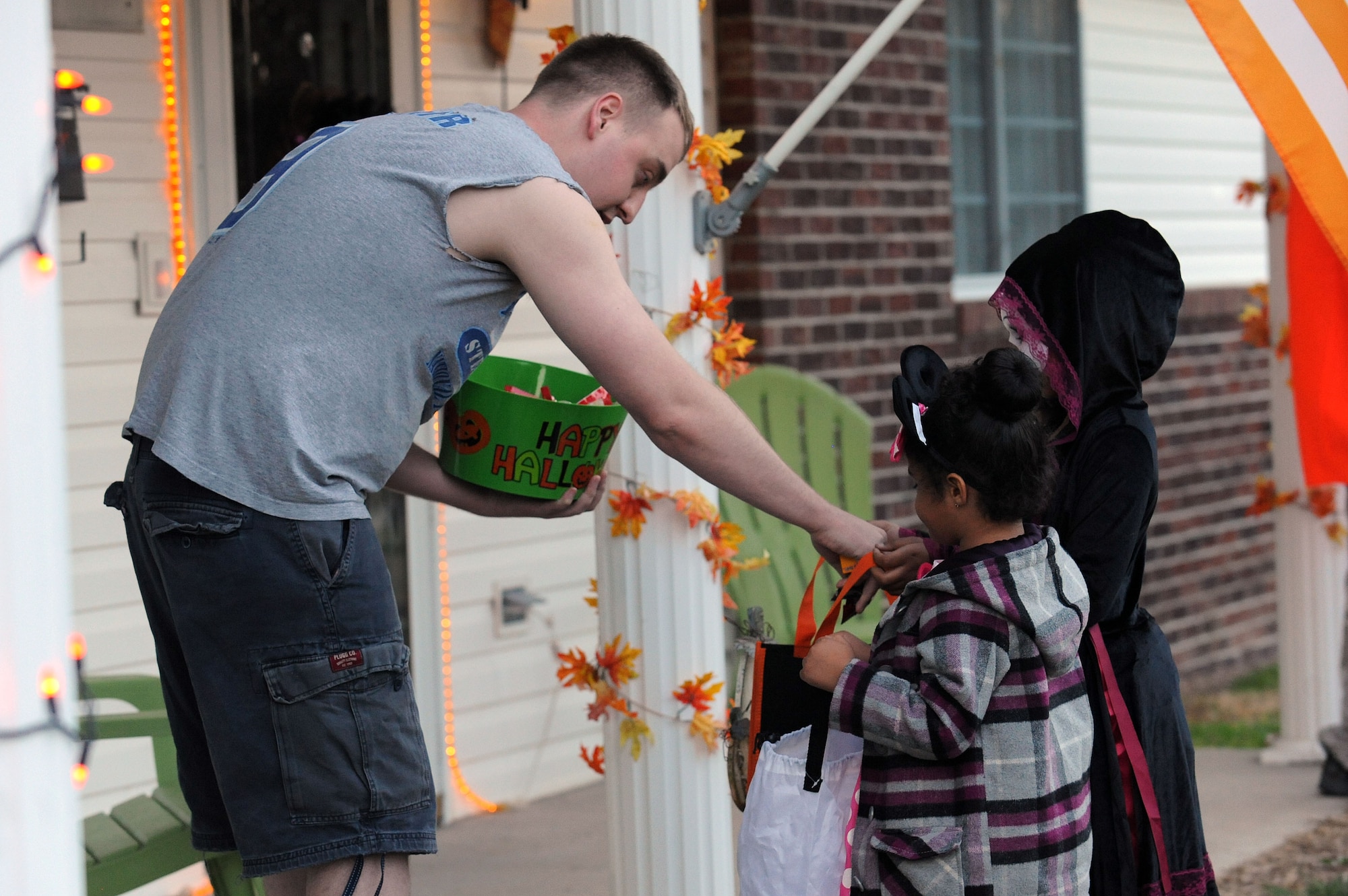 Members of Team Seymour do some trick-or-treating at Seymour Johnson Air Force Base, North Carolina, Oct. 31. (U.S. Air Force photo/Airman 1st Class Aaron Jenne)