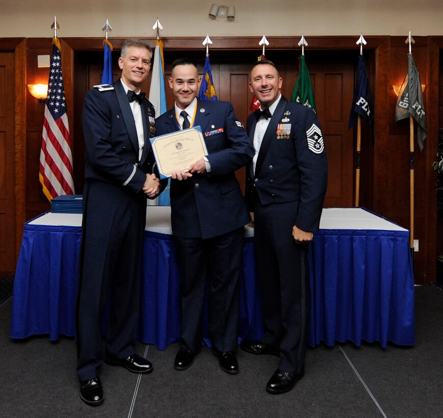 Airman Leadership School (ALS) is  a five-week professional military education course which serves as the educational bedrock for new noncommissioned officers. Col. Daniel Waters, 11th Wing Vice Commander and Chief Master Sgt. Vance Kondon, 11th Wing Command Chief present Sr. Airman Scott LaVerie, from 779th Medical Group Medical Support Squadron, with his ALS Graduation Certificate. (AF File Photo)