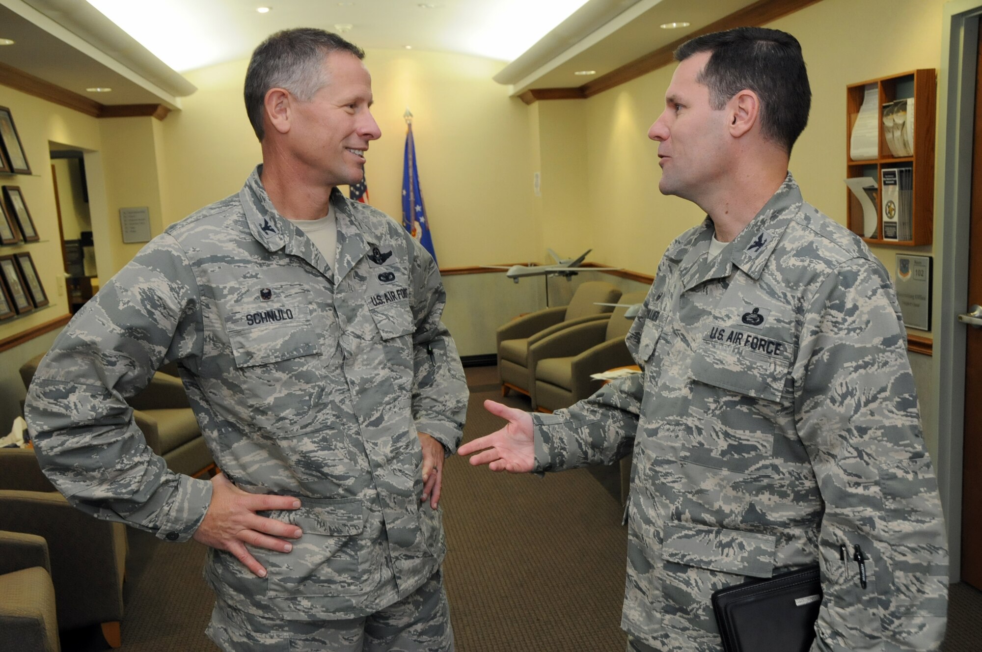 Col. John Devillier, 88th Air Base Wing commander, and Col. Gregory Schnulo, 178th Wing commander, meet at Springfield Air National Guard Base Oct. 29. Leaders from the 88th visited Springfield to gain a better understanding of the 178th Wing’s missions and strengthen their existing partnership. (Ohio Air National Guard photo by Senior Master Sgt. Joseph Stahl/Released)