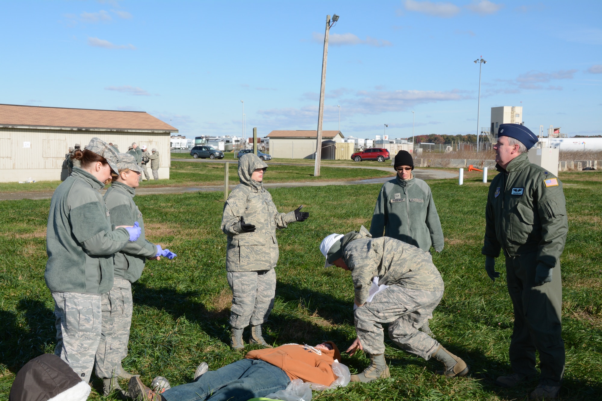 Reservists from the 512th Aerospace Medicine Squadron assess the simulated injuries of a Delaware Civil Air Patrol cadet during a mass casualty training exercise Nov. 2, 2014, at Dover Air Force Base, Del. The cadets exhibited simulated injuries including severe head trauma, dismembered limbs and open bone fractures. (U.S. Air Force photo/Senior Airman Joe Yanik)  