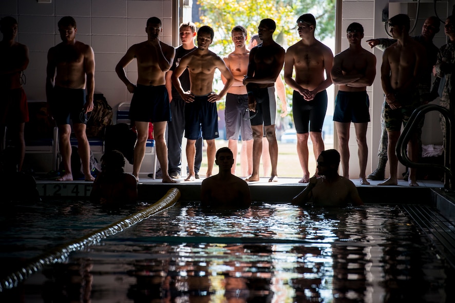Members of the 336th Recruiting Squadron’s delayed entry program prepare for a swim Nov. 3, 2014, at Moody Air Force Base, Ga. Individuals who are interested in becoming a special operations Airman visited Moody to take the physical ability and stamina test and to learn about the 38th Rescue Squadron’s mission. (U.S. Air Force photo by Airman 1st Class Ryan Callaghan/Released)