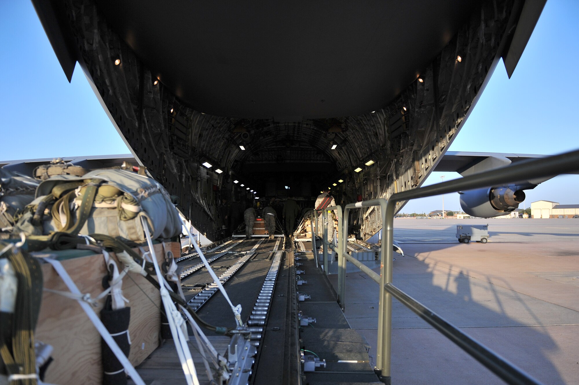 ALTUS AIR FORCE BASE, Okla. – Airmen from the 97th Logistics Readiness Squadron and 58th Airlift Squadron load a cargo pallet onto a U.S. Air Force C-17 Globemaster III cargo aircraft before an airdrop training mission Oct. 30, 2014. The 97th LRS and the 58th AS work together to ensure that future loadmasters have the training they need to perform airdrop missions during real-world contingency and humanitarian operations. (U.S. Air Force Photo by Senior Airman Dillon Davis/Released)