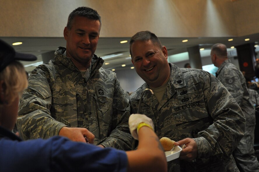 Chiefs and first sergeants served the annual thanksgiving dinner during lunch, Nov. 1, 2014, at the Pittsburgh International Airport Air Reserve Station.  The leadership served the lunch during the UTA to show their appreciation for the hard work and dedication of the Airmen during the holiday season. (U.S. Air Force photo by Senior Airman Justyne Obeldobel)