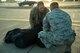 U.S. Air Force Lt. Col. Kristopher Struve, 13th Fighter Squadron commander, speaks with Capt. James Smith, 13th Aircraft Maintenance Unit officer in charge, after arriving to Misawa Air Base, Japan, from a six-month-long deployment Oct. 25, 2014. During the deployment, Struve and the fighter squadron supported the U.S. Air Forces Central Command mission by aggressively planning, preparing and presenting executable options to the commanders while standing ready to support contingency operations.  (U.S. Air Force photo by Staff Sgt. Alyssa C. Wallace/Released)