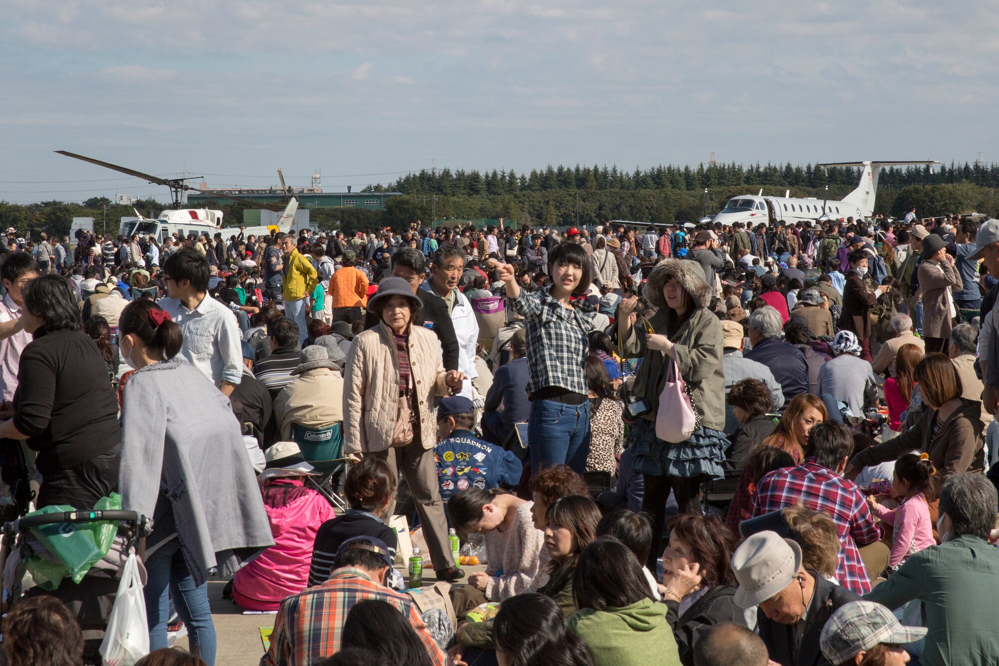 More than 290,000 people of all ages attended an annual air show at Iruma Air Base, Japan, Nov. 3, 2014. The 459 AS featured a UH-1N Huey and C-12 Huron as static display during the air show. (U.S. Air Force photo by Osakabe Yasuo/Released)
