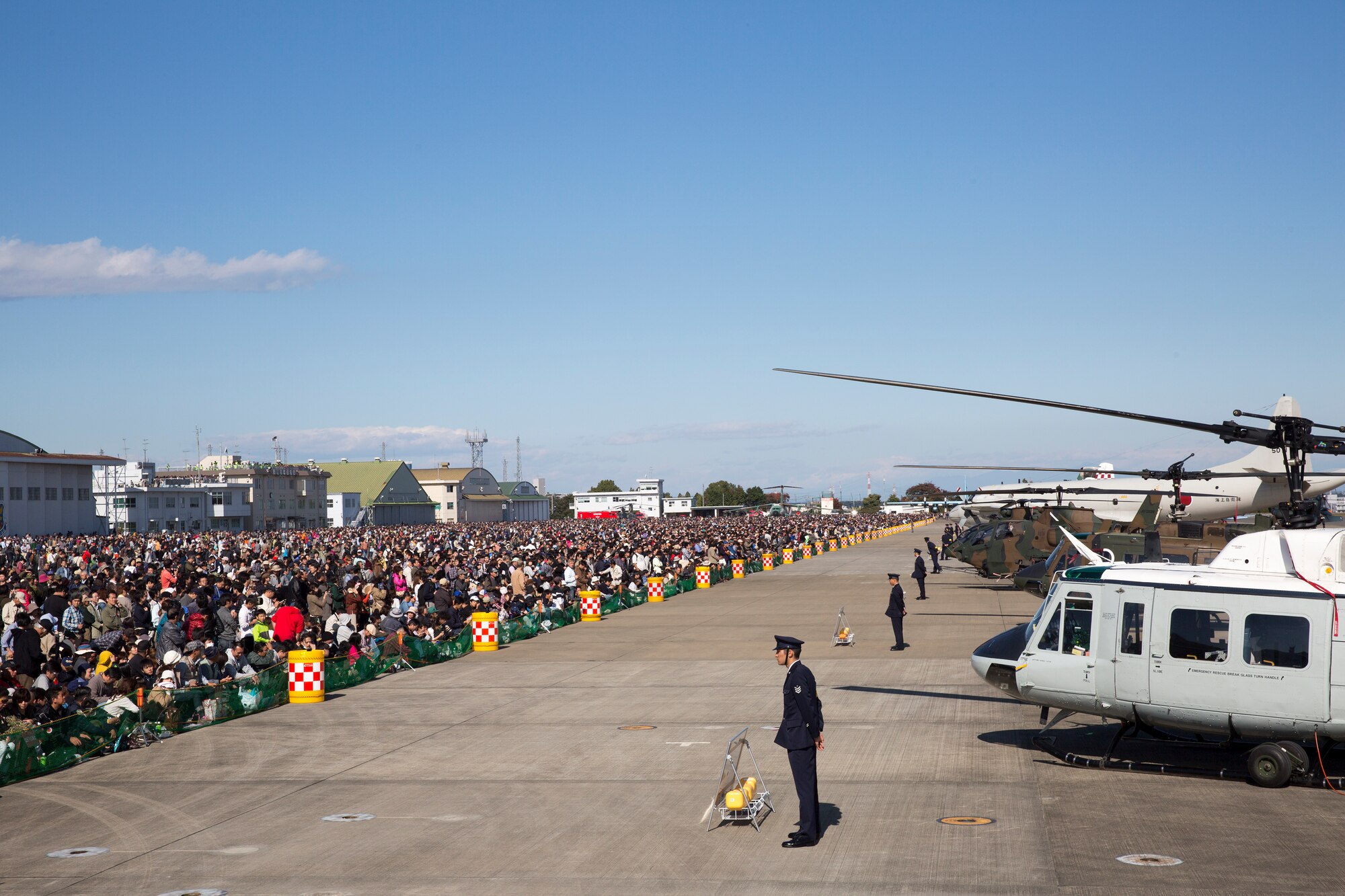 More than 290,000 people of all ages attended the annual air show at Iruma Air Base, Japan, Nov. 3, 2014. The 459 AS featured a UH-1N Huey and C-12 Huron as static displays during the air show. (U.S. Air Force photo by Osakabe Yasuo/Released)