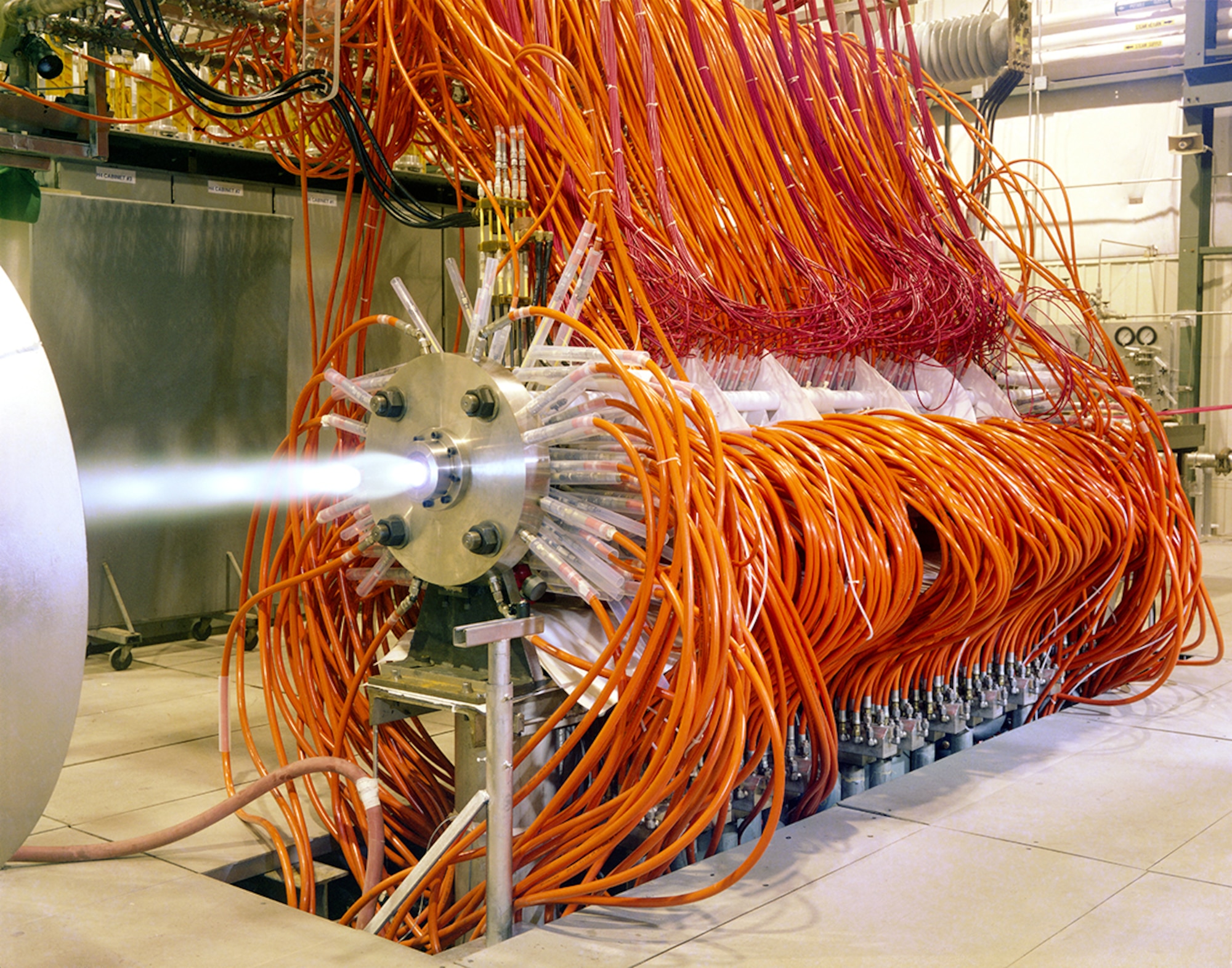 This photo shows the arc heater H3 being test fired prior to the installation of a model injection system. (AEDC Photo)