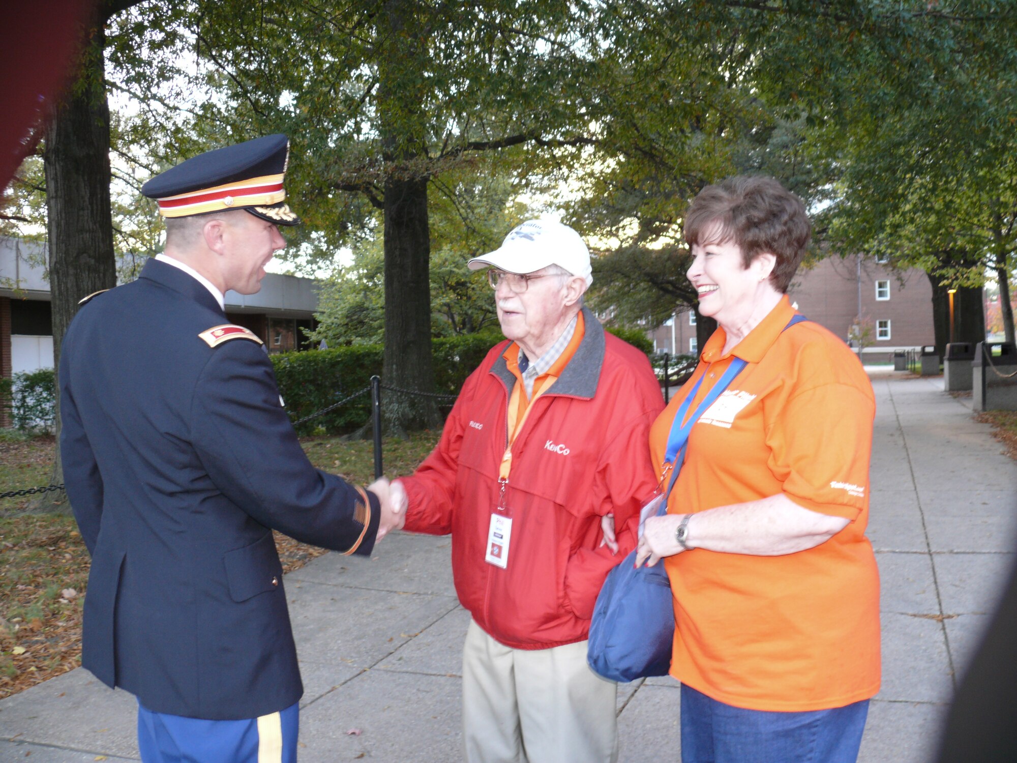 U.S. Army Maj. Paul Sipe from Manchester currently assigned with the U.S. Army Corps of Engineers greets World War II veteran Phil Tarver (center) and Honor Flight Guardian Charlie Young of Tullahoma at Arlington National Cemetery on Oct 18. Tarver was a Navy aerial photographer in the Pacific theater flying on the Navy version of the B-24 Liberator. He worked 33 years at AEDC as a photojournalist. (Photo by Claude Morse)