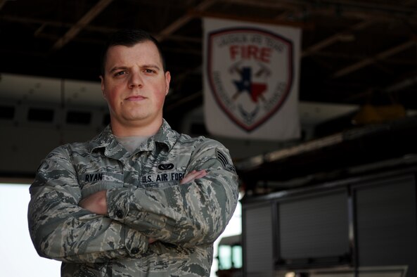Senior Airman Richard Ryan, 47th Civil Engineer Squadron firefighter, poses for a portrait at the Laughlin Fire Station on Oct. 30, 2014. Ryan provided first aid response to a victim of a car accident on Highway 90, keeping the individual stable and responsive until the paramedics arrived on scene. U.S. Air Force photo by Airman Ariel D. Delgado)(Released)