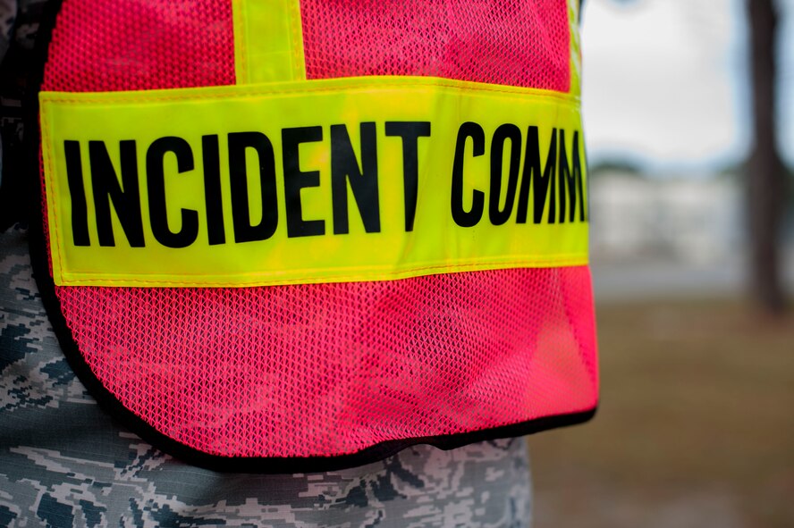 The incident commander stands by during a fuel containment exercise Nov. 5, 2014, at Moody Air Force Base, Ga. The incident commander organized a simulated evacuation and cleaning of about 10,000 gallons of fuel that spilled onto the flightline. (U.S. Air Force photo by Airman 1st Class Dillian Bamman/Released)