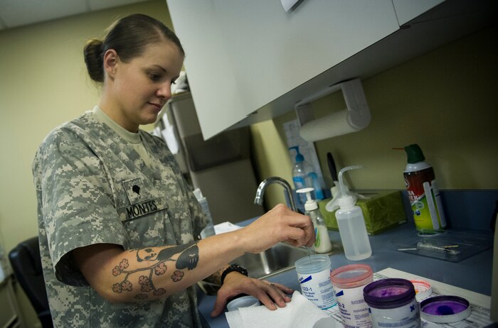 Army Spc. Valeria Montes, 628th Medical Group veterinarian, tests a pet’s urine sample Nov. 4, 2014, at the Veterinarian Treatment Facility on Joint Base Charleston, S.C. The urinalysis can provide veterinarians information about the kidneys and bladder, the liver, pancreas and other organs, allowing veterinarians to determine a prognosis and treatment plan. (U.S. Air Force photo/Airman 1st Class Clayton Cupit)