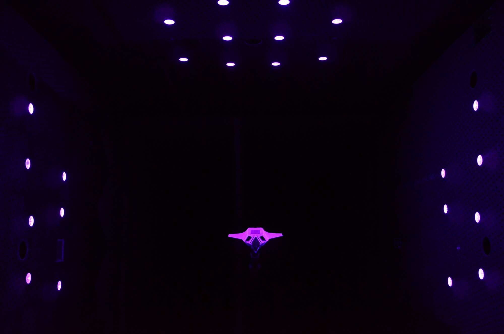 The dynamic PSP was used on the Lockheed Martin V7 model, a 1980s Advanced Tactical Fighter concept, to measure the acoustic pressure levels in the bay. This photo shows the illumination of the model by the purple LEDs.