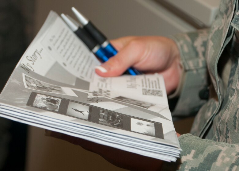 A 50th Space Wing Combined Federal Campaign key worker holds a CFC pledge form, Nov. 4, at Schriever Air Force Base, Colo. This year CFC donors have the option to use myPay to donate.  (Air Force Photo/ Senior Airman Naomi Griego)