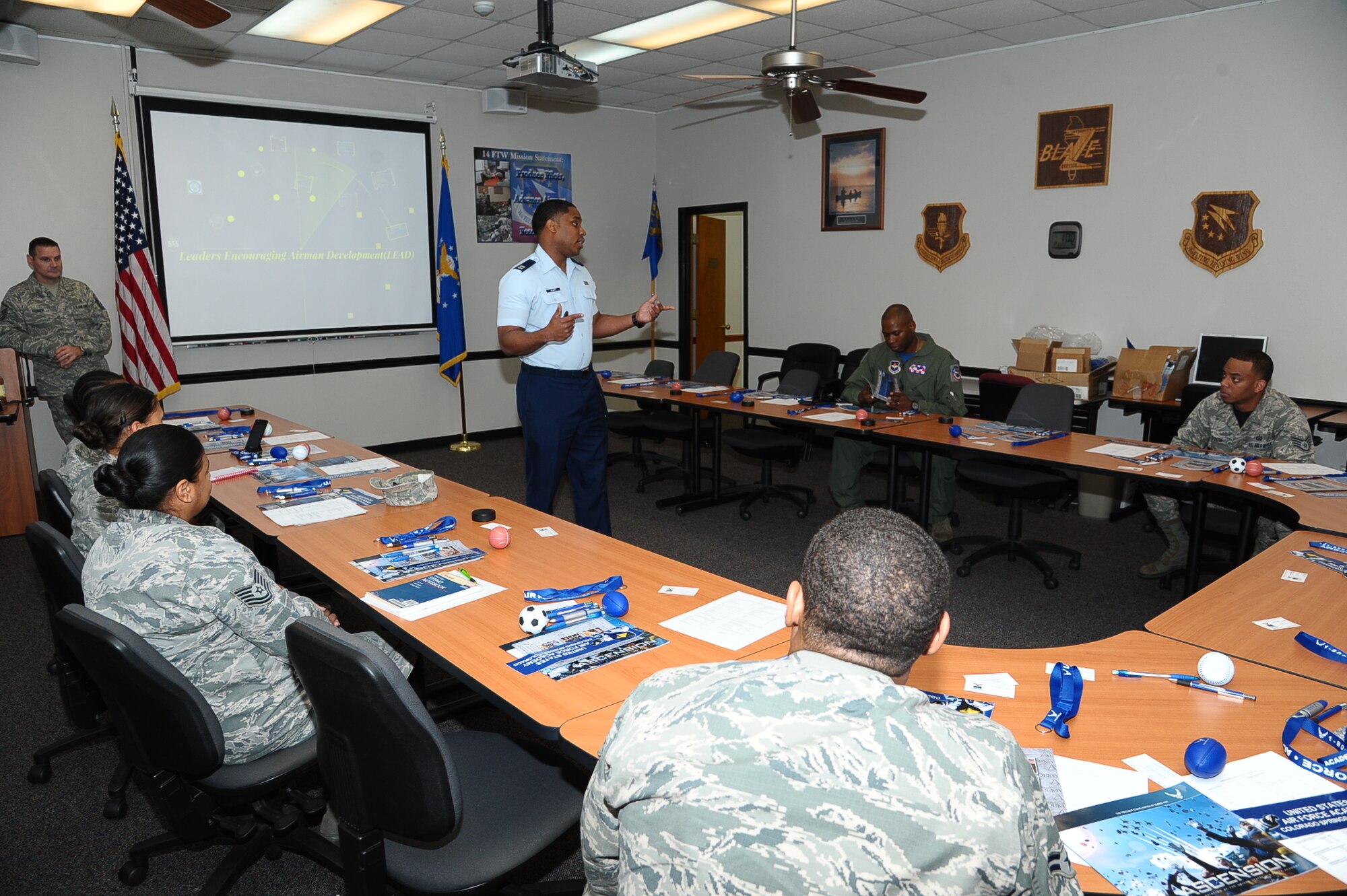 Capt. Steven Clark, U.S. Air Force Academy Deputy Director, Region Two, speaks with Columbus Air Force Base Airmen about the Leaders Encouraging Airman Development program Oct. 31 in the education center. The LEAD program is a process where active-duty Airmen can become cadets and pursue commissioning through the Air Force Academy. (U.S. Air Force photo/Airman Daniel Lile)