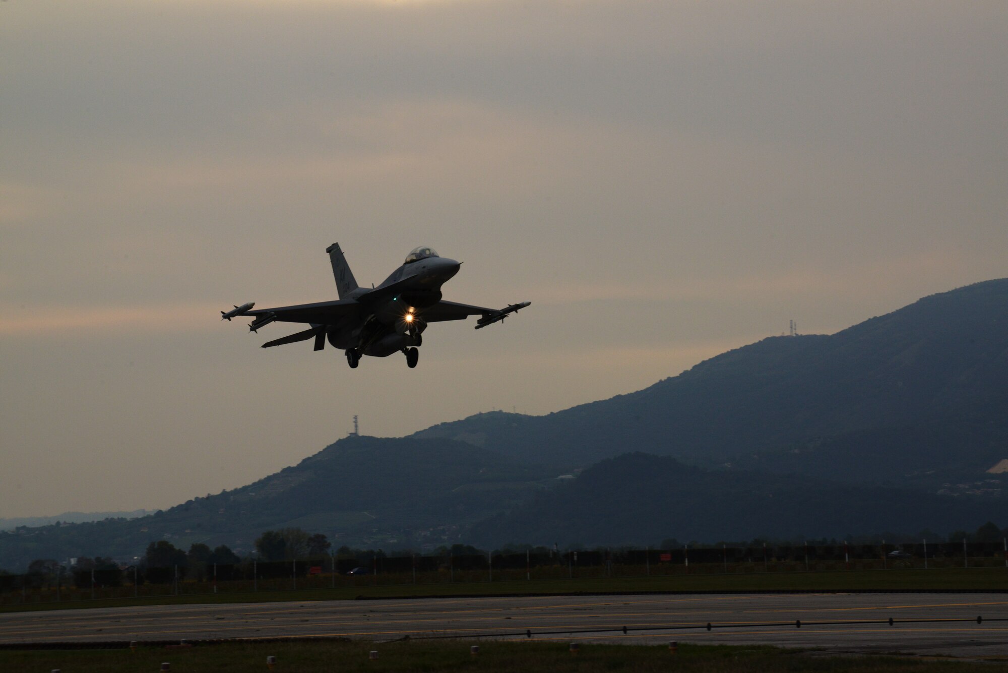 Capt. Matthew Alexander, 555th Fighter Squadron pilot, returns from a training flight, Oct. 15, 2014, at Aviano Air Base, Italy. Alexander is an U.S. Air Force fighter pilot and his mission is to deter aggression through a rigorous training program. (U.S. Air Force photo/Airman 1st Class Ryan Conroy)