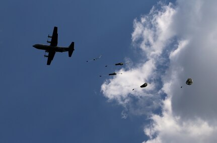 Paratroopers with the Texas Army National Guard 1st Battalion (Airborne), 143rd Infantry Regiment, parachute onto a drop zone Oct. 24, 2014 at Joint Base San Antonio-Camp Bullis. The joint exercise provided relevant training opportunities to service members to train on both individual and collective team skills to help meet mission readiness requirements. (U.S. Air Force photo by Johnny Saldivar)