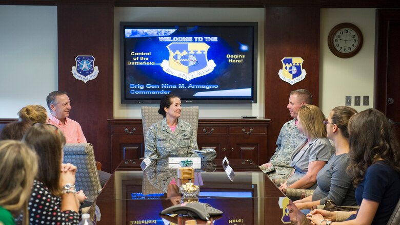 Brig. Gen. Nina Armagno, 45th Space Wing commander, invited Key Spouses to attend a guided tour of Patrick Air Force Base and Cape Canaveral Air Force Station, Fla., Oct. 24, 2014. The guests received unit mission briefings, visited facilities, and launch pads, during the tour, which provided them with increased awareness of the mission here. The Key Spouse program is an official unit-family program designed to enhance readiness and establish a sense of Air Force community. (U.S. Air Force photo/Matthew Jurgens)