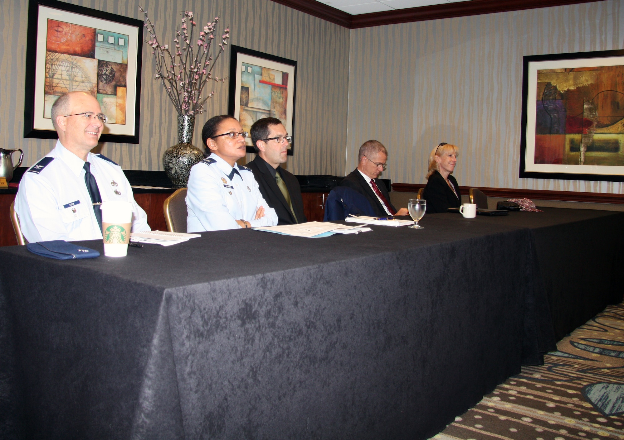 From left, current CE leaders Col. Michael Kozak, Col. Valerie Hasberry and Robert Gill, and retired Cols. Dave Martinson and Elizabeth Brown were some of the many attendees excited to come together for the afternoon to discuss hot topics and catch up with former colleagues. (U.S. Air Force photo/Erin Maloney/Released)