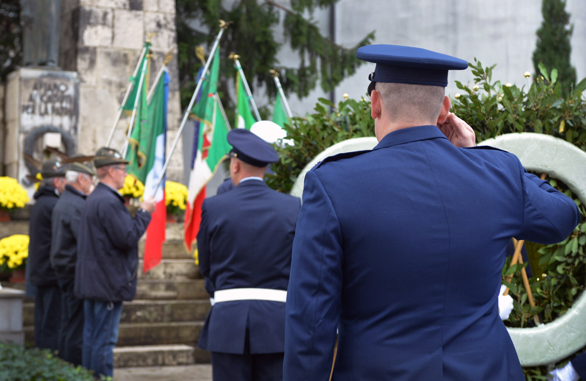 Lt. Col. David Boles, 31st Maintenance Group deputy commander, renders a salute during the Italian national anthem, Nov. 4, 2014, in Aviano, Italy. The Italian holiday commemorates the end of World War I and those who gave the ultimate sacrifice during the war. During the memorial, three wreaths were laid in honor of the "Pagliano e Gori" Italian Air Force, the Aviano municipality and the 31st Fighter Wing. (U.S. Air Force photo/Senior Airman Abbey Whittaker)