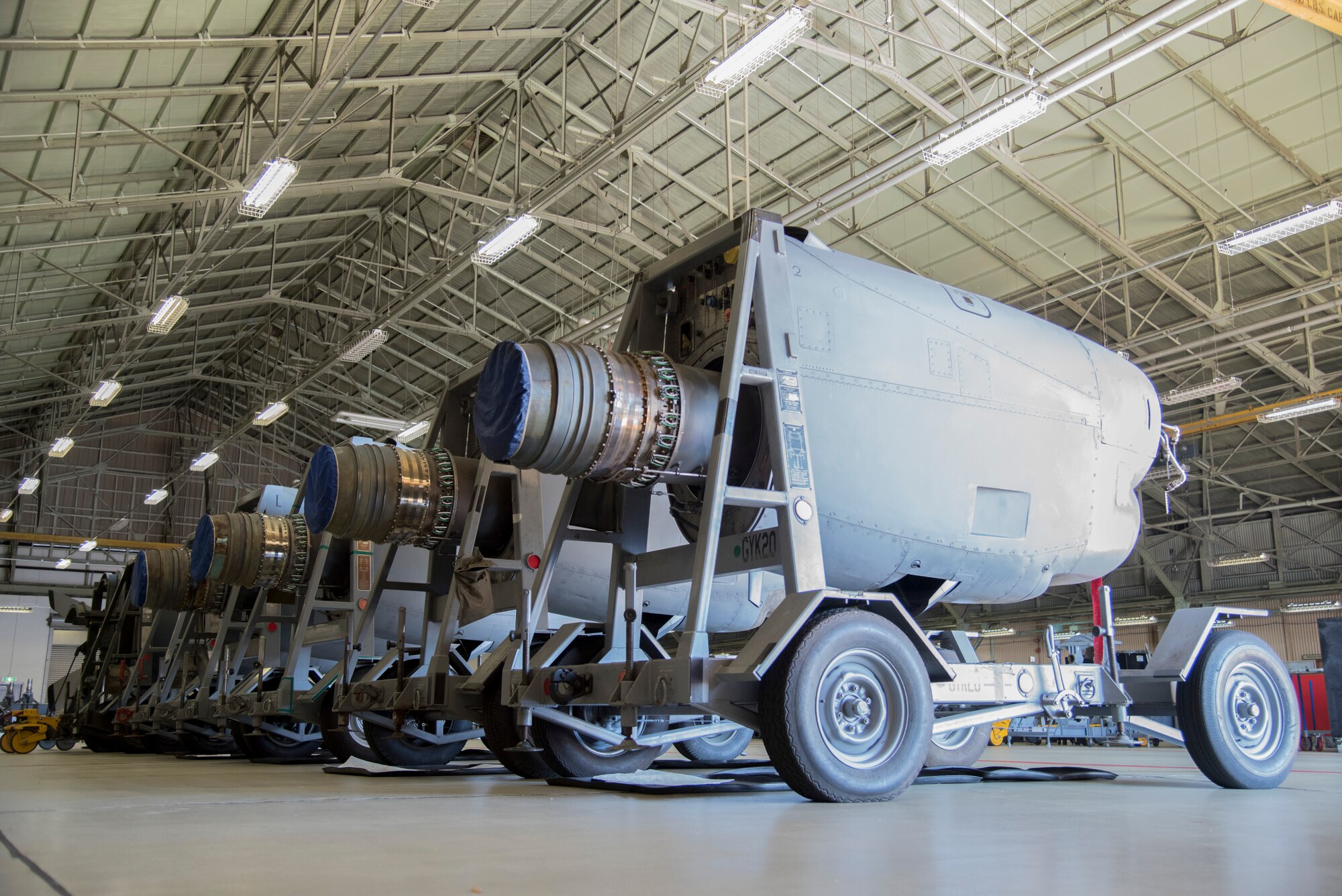 Completed C-130 T56 engines sit in a row at the 374th Maintenance Squadron aerospace propulsion flight hangar at Yokota Air Base, Japan, Oct. 29, 2014. The propulsion flight has supported numerous operations such as Enduring Freedom, Iraqi Freedom, Cope North, Joint Force, Keen Sword, Keen Edge, Cope Thunder, Tomodachi and Christmas Drop. (U.S. Air Force photo by Senior Airman Michael Washburn/Released)