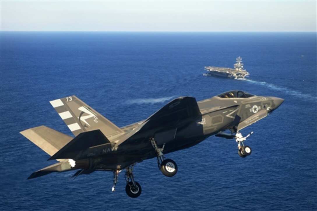 An F-35C Lightning II, carrier variant, joint strike fighter, approaches the USS Nimitz to land, during operations in the Pacific Ocean, Nov. 3, 2014.