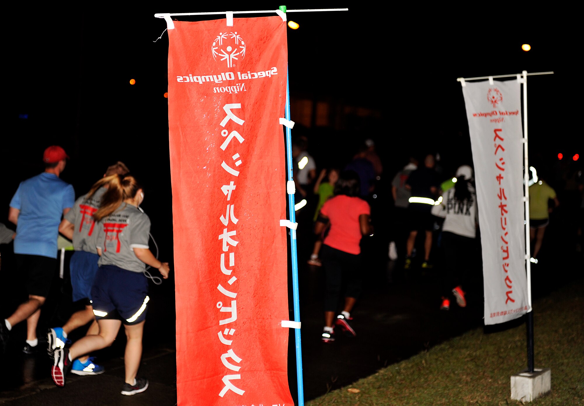 The 353rd Special Operations Group conducts a 5k fun run to support of the Kadena Special Olympics on Kadena Air Base, Japan, Oct. 31, 2014. The 5k fun run is an annual event intended to raise awareness of the Kadena Special Olympics. This year marks the 15th annual KSO, scheduled for Nov. 8. (U.S. Air Force photo by Naoto Anazawa)