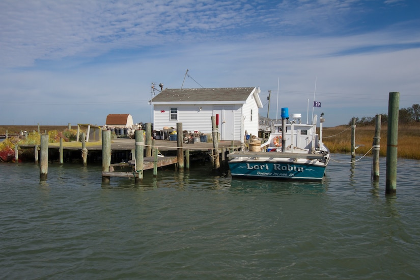 TANGIER, Va. – The Lori Robin, a Tangier Island based waterman boat sits dockside in the island’s harbor here November 3, 2014. The Norfolk District, U.S. Army Corps of Engineers is working on a breakwater that will help protect the boats and shacks in the harbor from damaging wave attack during coastal storms. (U.S. Army photo/Patrick Bloodgood)