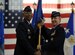 Vice Chief of Staff Gen. Larry O. Spencer, left, passes the Air Combat Command guidon to Gen. Hawk Carlisle during ACC’s change of command ceremony Nov. 4, 2014, at Langley Air Force Base, Va. Carlisle assumed command from Gen. Mike Hostage, who retired after 37 years of service to the Air Force. (U.S. Air Force photo/Staff Sgt. Candice Page)