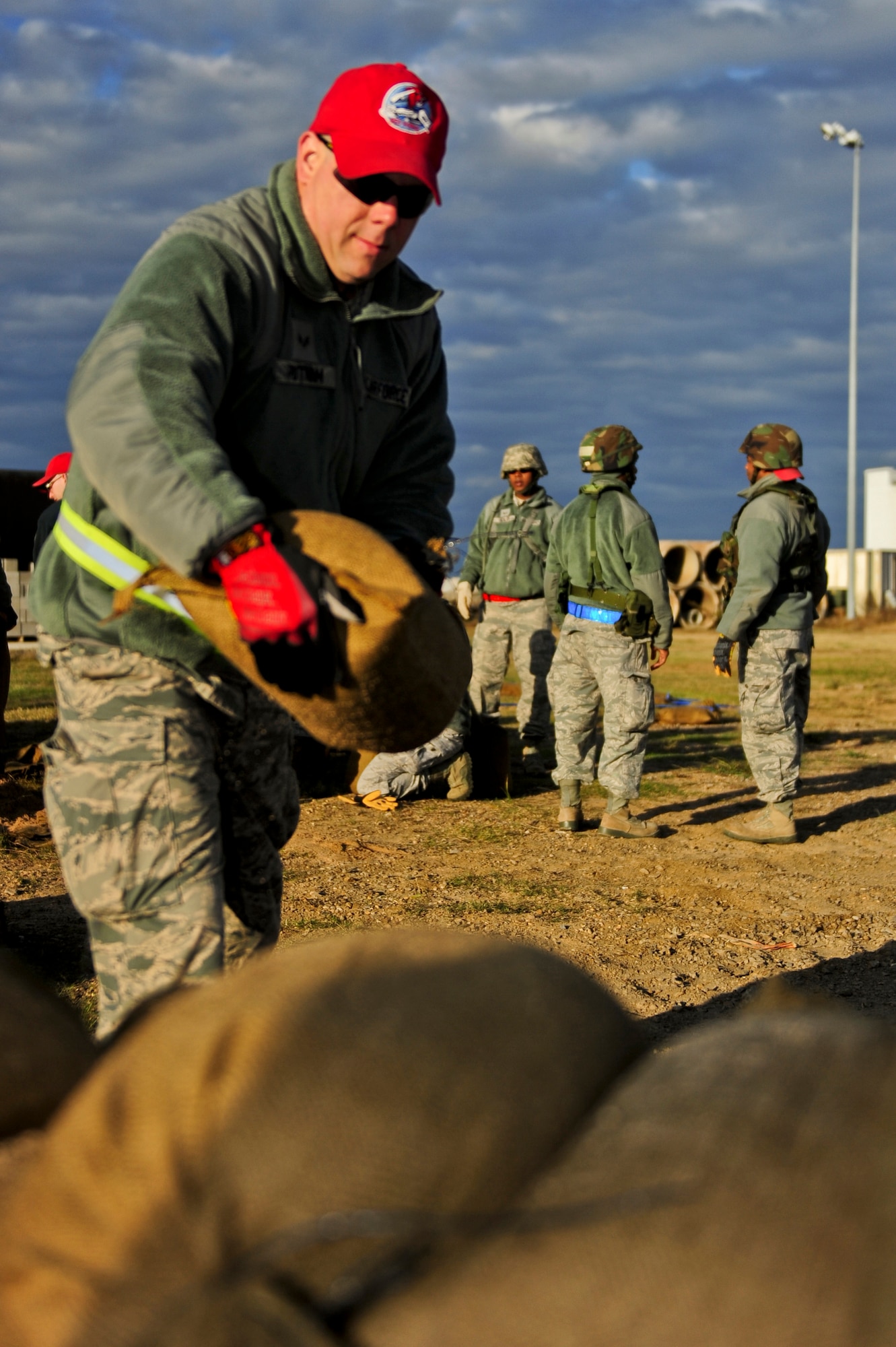 Senior Airman Christopher Putnam builds a defensive fighting position during a field training exercise  Nov. 3, 2014, at Fort Smith, Ark. The weeklong exercise offers 174 participants upgrade training and preparation for an upcoming operation in support of Beyond the Horizon. Beyond the Horizon, conducted annually, is part of U.S. Army South and U.S. Southern Command’s humanitarian and civic assistance program, which works closely with host-nation forces and civilian organizations to provide medical, dental and engineering support. Putnam is with the 567th RED HORSE Squadron out of Seymour Johnson Air Force Base, N.C. (U.S. Air Force photo/Airman 1st Class Brittain Crolley)