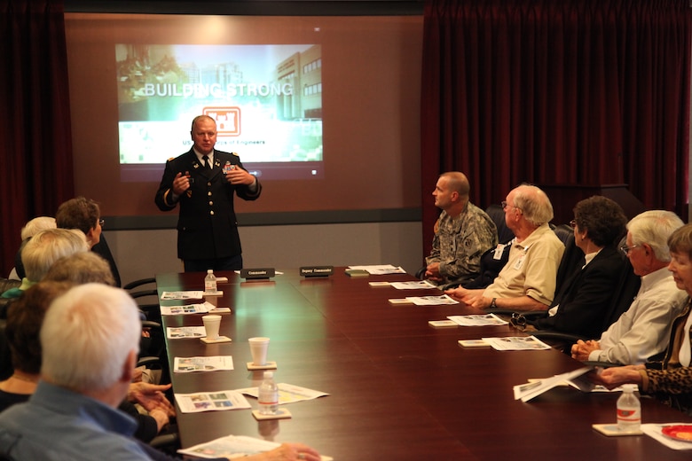 U.S. Army Engineering and Support Center  commander Col. Robert Ruch briefs a group of retired U.S. Army Corps of Engineers’ Senior Executive Service members and their spouses the Oct. 29 for the first Leaders Emeritus , visit to the Center. The group meets every 18 months and visits U.S. Army Corps of Engineers' organizations to keep current with USACE operation and how the Corps continues to provide service to the nation.  
