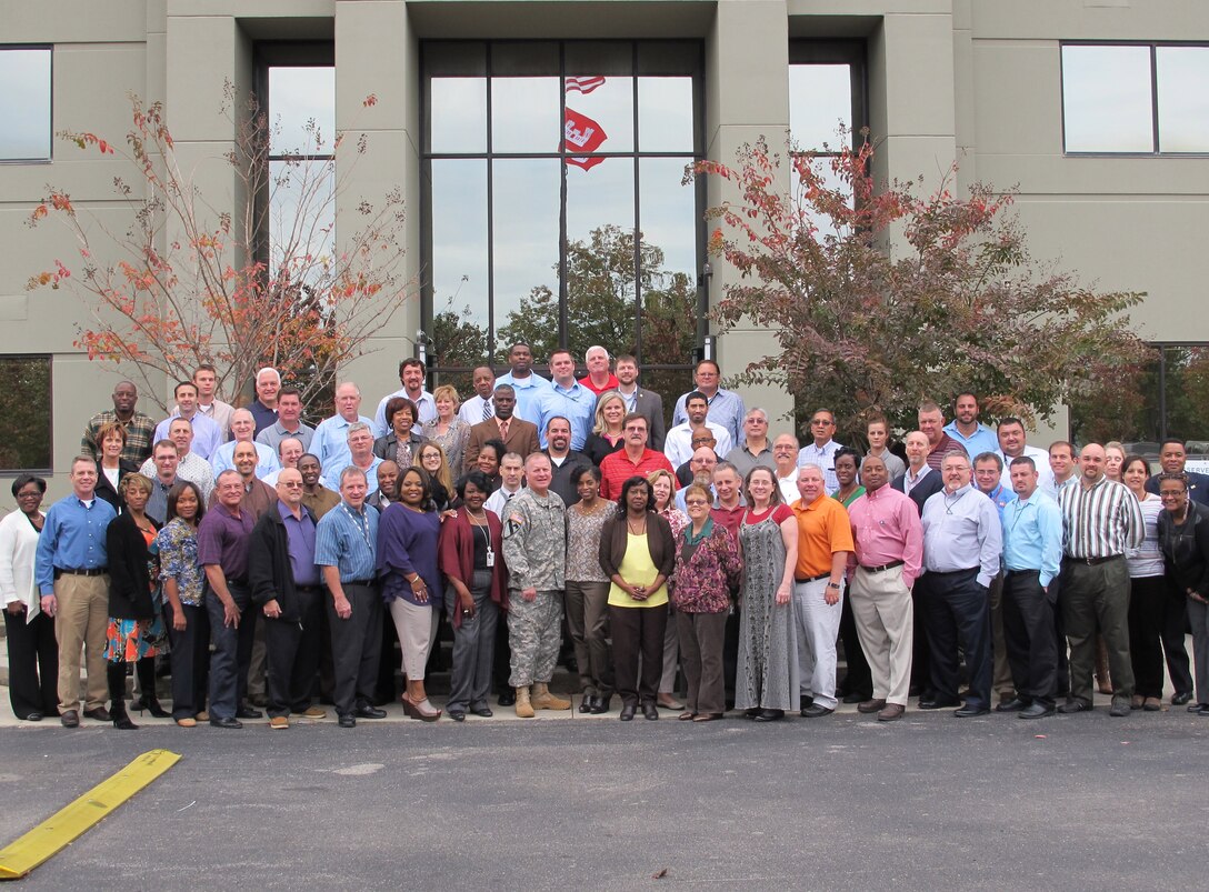 Huntsville Center Commander Col. Robert Ruch 
(first row, center) takes a photo with veterans at the organization Nov. 5.