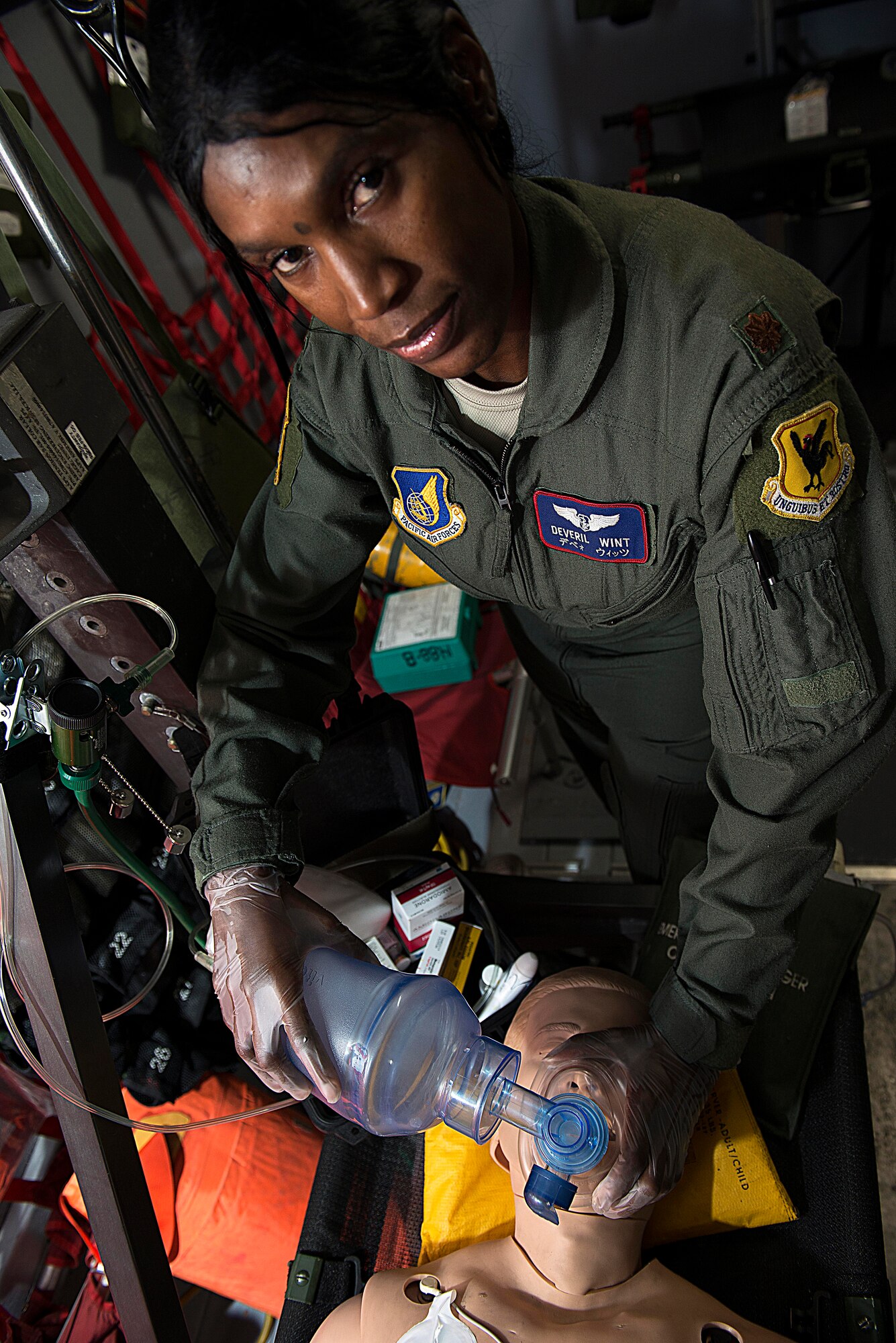 U.S. Air Force Maj. Deveril Wint, 18th Aeromedical Evacuation Squadron operations flight commander, recently claimed the Commemorative Air Force Dolly Vinsant Flight Nurse of the Year Award for her actions throughout 2013. During the award period, Wint is credited with medical crew direction during 35 missions, 28 of which were combat sorties, which transported 235 patients in the Pacific theater and in support of OPERATION ENDURING FREEDOM. The major also flew more than 240 combat hours while deployed to Ramstein Air Base, Germany. (U.S. Air Force photo by Senior Airman Maeson L. Elleman/Released)