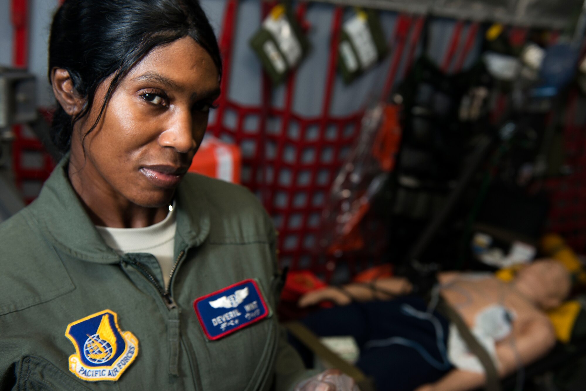 U.S. Air Force Maj. Deveril Wint, 18th Aeromedical Evacuation Squadron operations flight commander, recently claimed the Commemorative Air Force Dolly Vinsant Flight Nurse of the Year Award for her actions throughout 2013. During the award period, Wint is credited with medical crew direction during 35 missions, 28 of which were combat sorties, which transported 235 patients in the Pacific theater and in support of OPERATION ENDURING FREEDOM. The major also flew more than 240 combat hours while deployed to Ramstein Air Base, Germany. (U.S. Air Force photo by Senior Airman Maeson L. Elleman/Released)